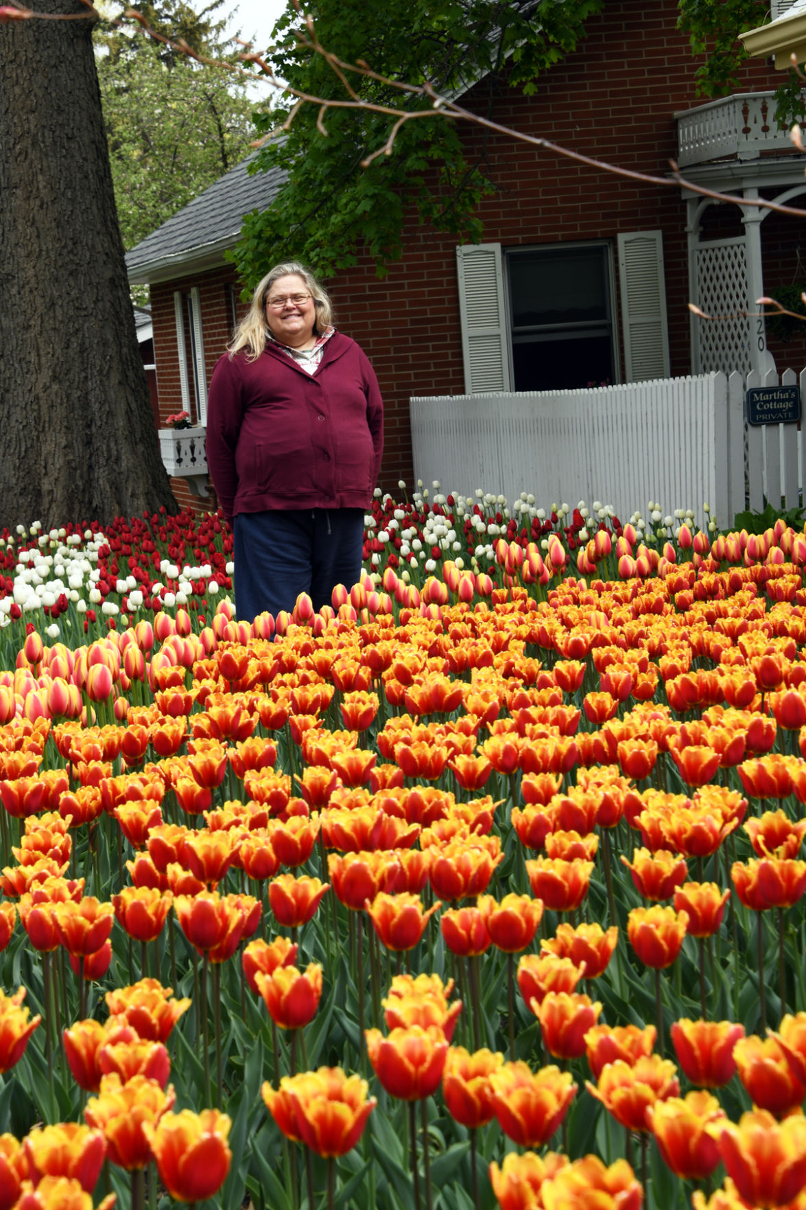 222 Linda Jaeger in tulip garden in Pella.JPG